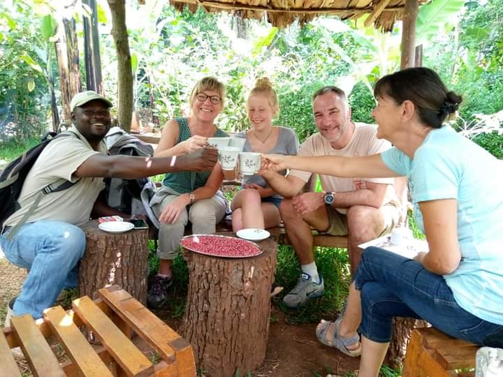 TOURING THE SLOPES OF KILIMANJARO DURING END OF YEAR FESTIVAL SEASON